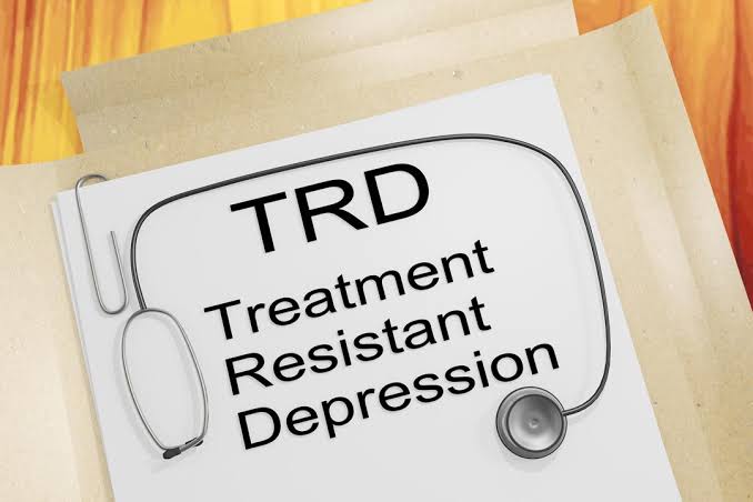Professional psychiatrist helping an adult with Treatment Resistant Depression